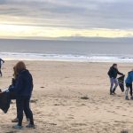 Scouring the beach for litter